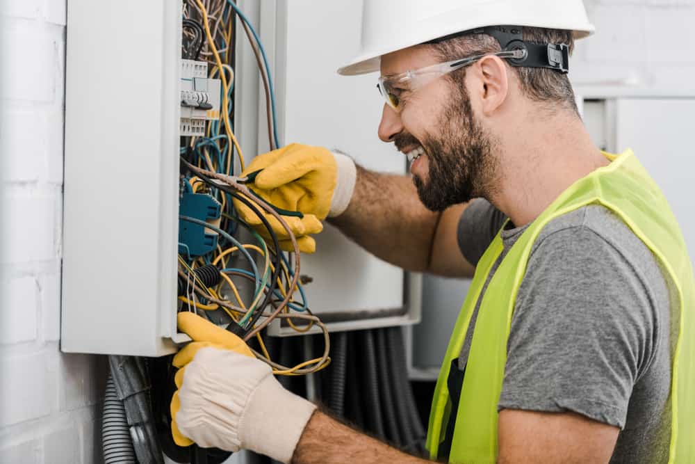 electrician working in panel